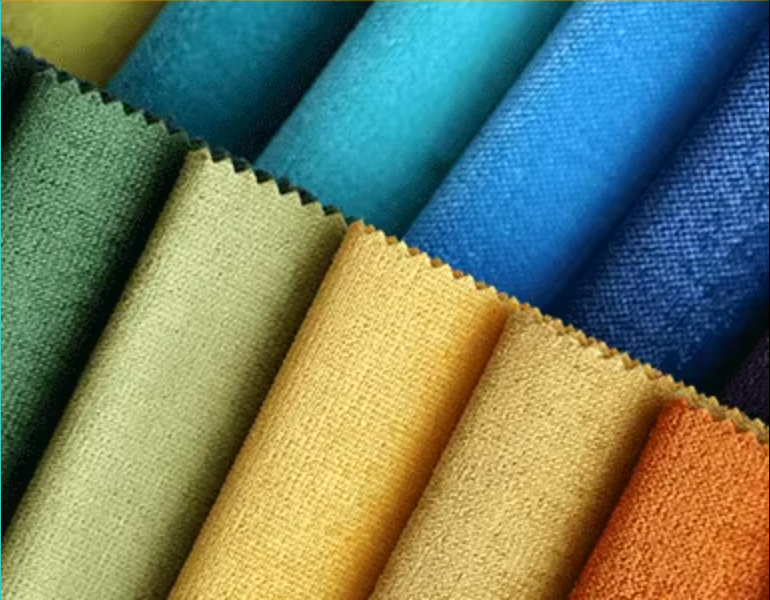 A variety of high-quality hat fabrics in a range of colors are on display, including textured fabric details in green, yellow, blue, and orange.